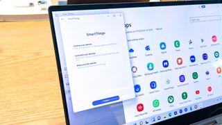 An image of a Samsung Galaxy Book 2 Pro 360 showing SmartThings and the app menu open.