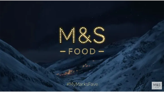 The end still of an M&S Food advert with the letters of the logo spelled out with fairylights.