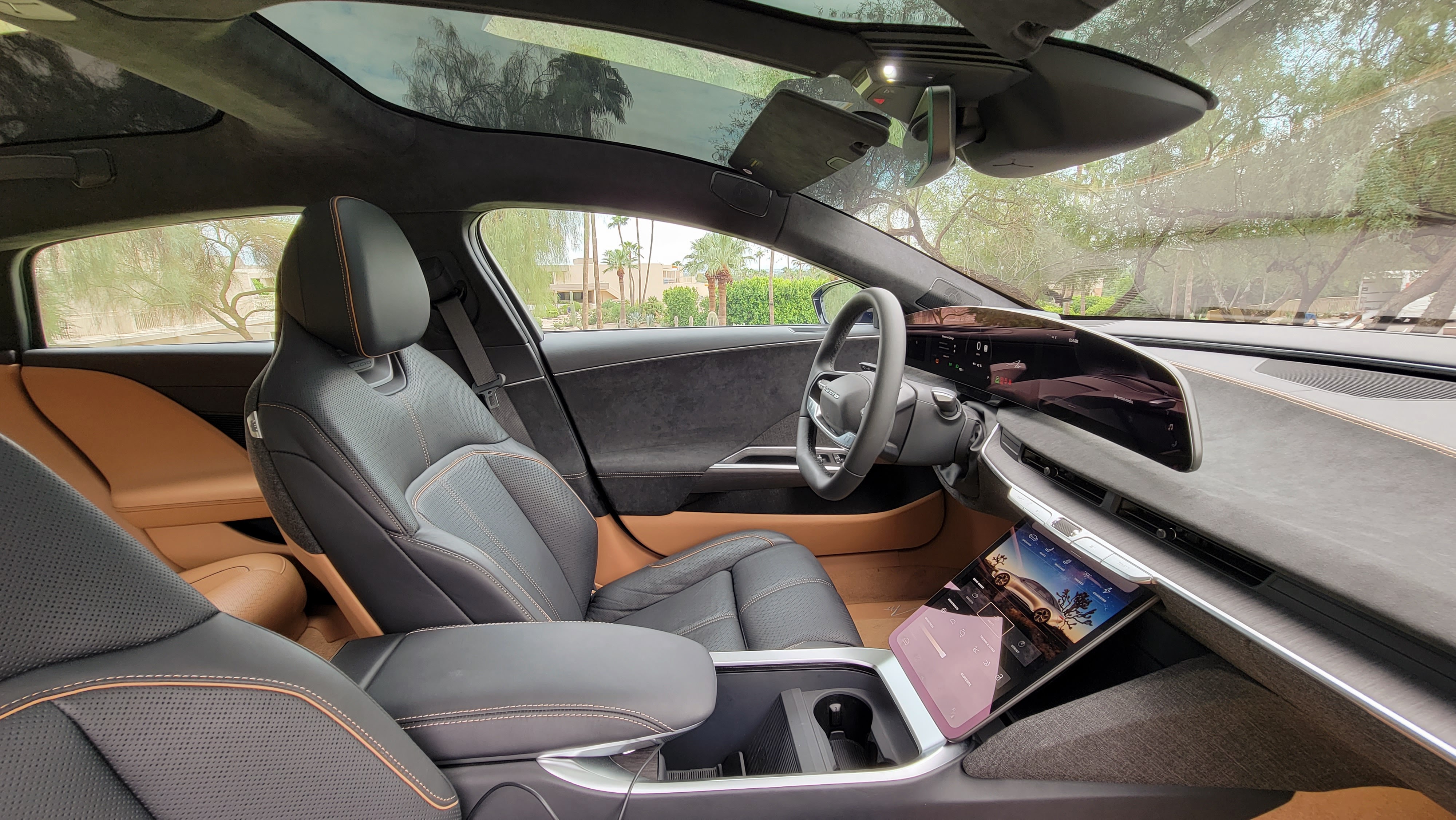 Inside the Lucid Air cabin showing driver's seat and dash