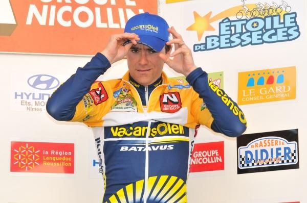 Borut Bozic (Vacansoleil Pro Cycling Team) receives the leader's jersey.