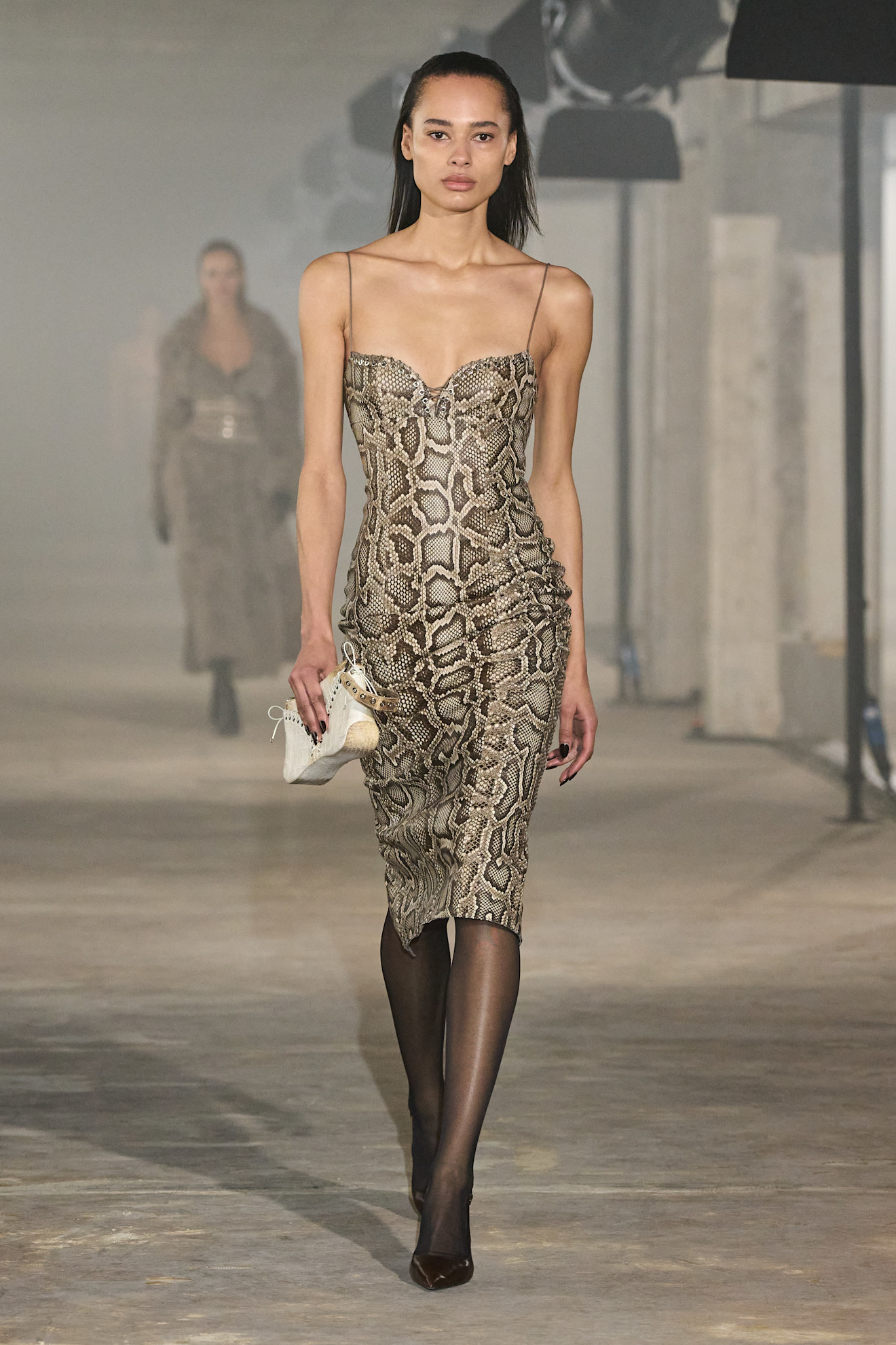 A model wore Sophie Turner's snakeskin dress on the Ludovic de Saint Sernin Fall 2025 runway