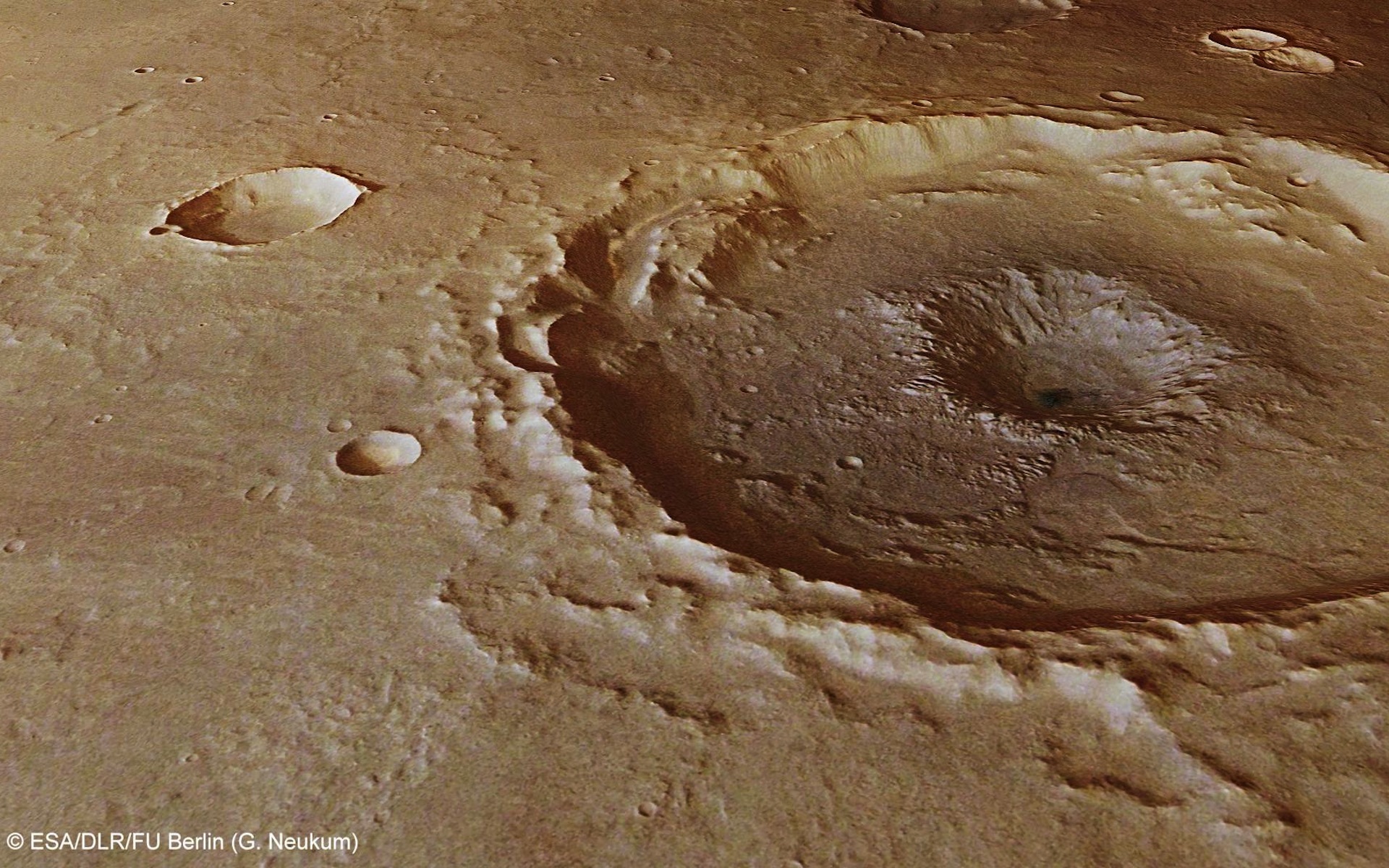 Crater in Thaumasia Planum space wallpaper