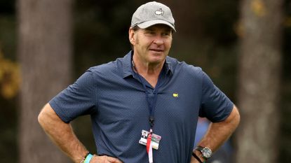 Sir Nick Faldo watches during a practice round before the 2020 Masters