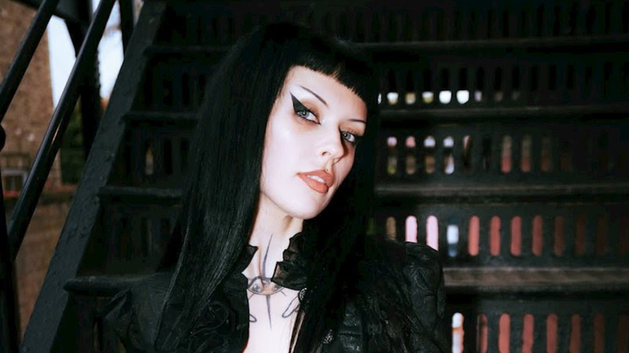 Harpy sitting on some steps