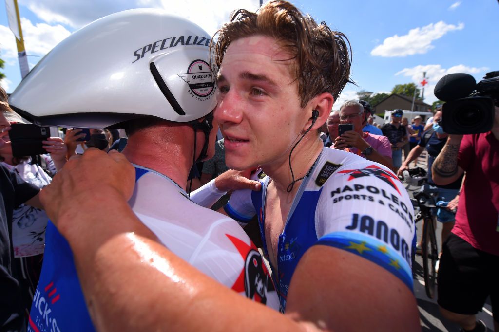 GAVERE BELGIUM JUNE 23 LR Silver medalist Yves Lampaert of Belgium gold medalist Remco Evenepoel of Belgium celebrate after the 123rd Belgian Road Championship 2022 Mens Individual Time Trial a 348km individual time trial one day race from Gavere to Gavere ITT BelgianCycling140 on June 23 2022 in Gavere Belgium Photo by Luc ClaessenGetty Images