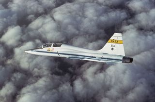 NASA’s T-38 jet, tail no. 913, is seen in chase of the Shuttle Carrier Aircraft mated with the orbiter Enterprise in 1977. The same jet is going on display with the prototype shuttle at the Intrepid Sea, Air and Space Museum in New York City.