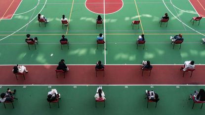 Students sit university exams in Hong Kong