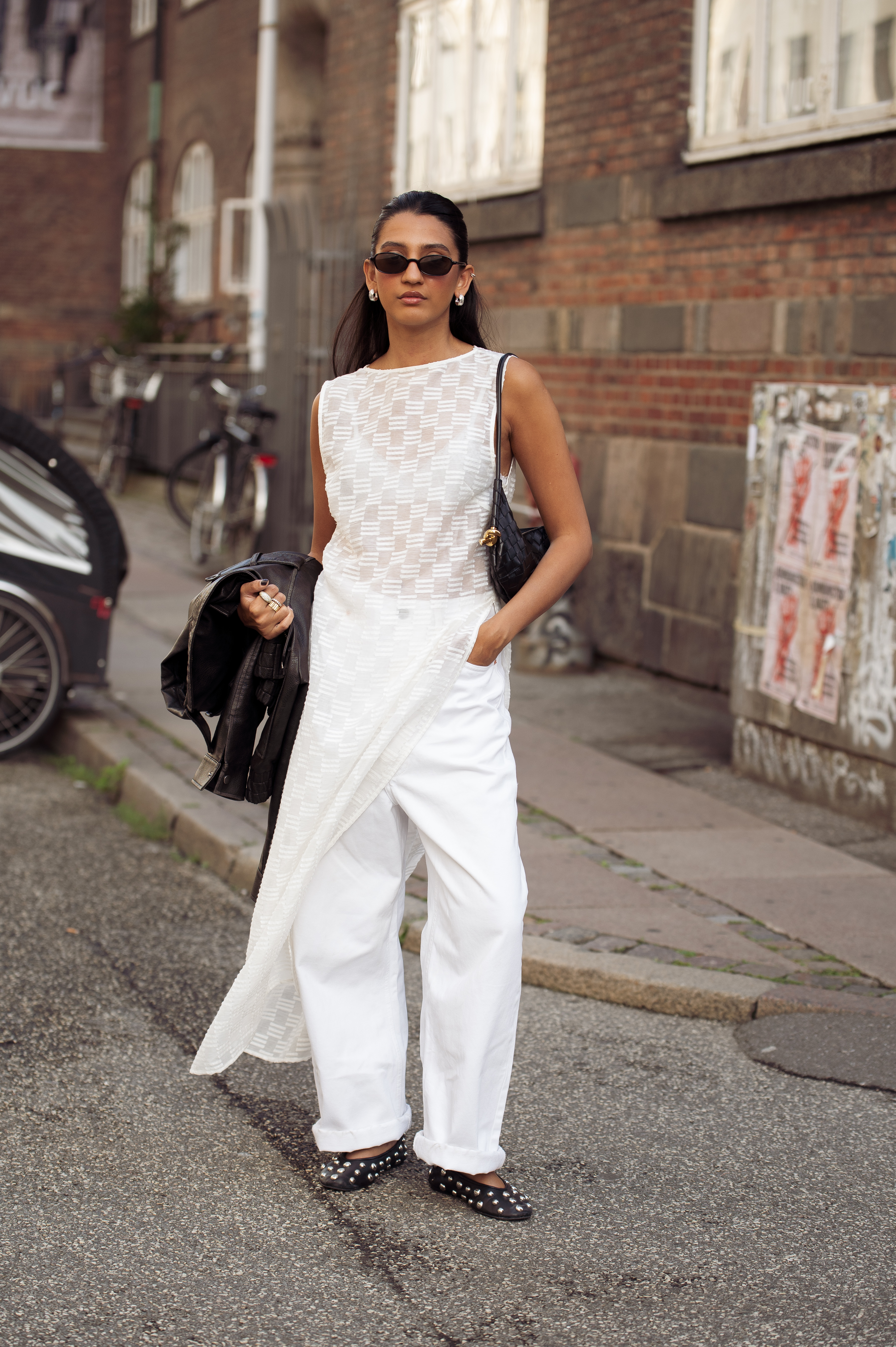 A guest wore studded ballet flats during Copenhagen Fashion Week