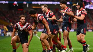 Mark Nawaqanitawase of the Roosters celebrates with team mates after scoring a try during NRL Preliminary Final match between the Dolphins and Sydney Roosters