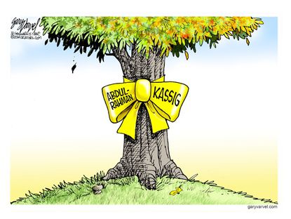 Editorial cartoon yellow ribbon Abdul-Rahman Kassig world