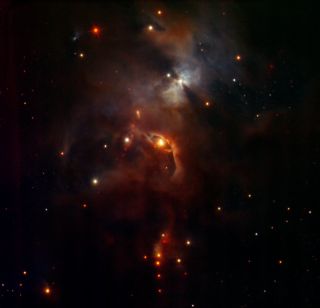 A view of the Serpens Nebula from the HAWK-I instrument on the European Southern Observatory's Very Large Telescope in Chile. The filters used here cover wavelengths similar to the ones Hubble can see.
