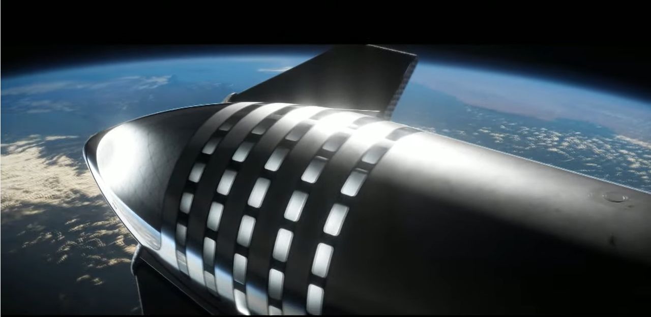 A still from a SpaceX video animation of the company's Starship rocket and Super Heavy booster launching astronauts to Mars, a trip that includes orbital refilling and booster landings.