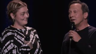 Elle King and her father Rob Schneider singing