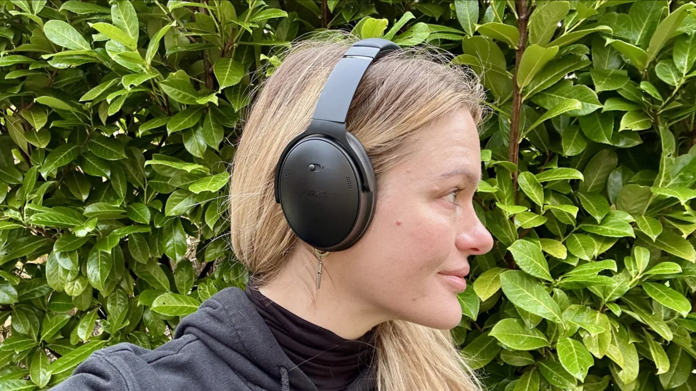 TechRadar contributor Becca Caddy wearing the Bose QuietComfort headphones