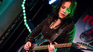 Frankfurt/Main, Germany. 11th April, 2018. Jen Majura, German rock guitarist (Evanescence) performs at Guitar Camp stage at Musikmesse Frankfurt, trade fair for musical instruments, sheet music, music production and marketing.