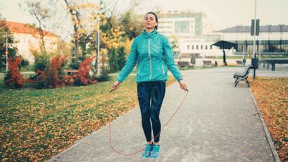 A woman using a jump rope