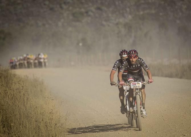 Rene Haselbacher and Wolfgang Krennhe of Team Asrin are the first break away during stage 2