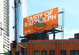 Billboard for West Loop, featuring stylised hot dog, on top of building