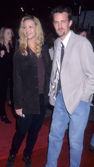 Actress Lisa Kudrow and actor Matthew Perry attend the "Liar Liar" Universal City Premiere on March 18, 1997 at Universal Amphitheatre in Universal City, California.