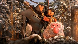 Image of Beetle, Monkey and Kubo in Kubo and the Two Strings. They are all smiling in a sunny environment.