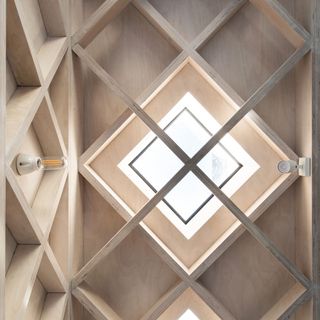 wooden lattice work on ceiling with rooflight