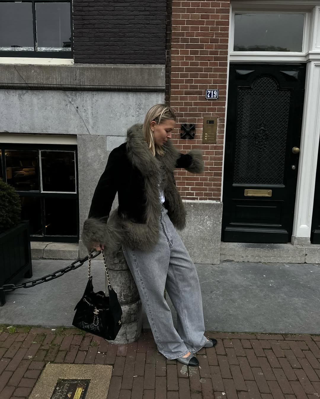 Stylish women wearing grey jeans