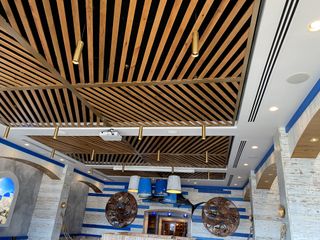 The new audio system throughout Captain Anderson’s Restaurant includes a combination of 26 AtlasIED FAP63T and FAP42T coaxial in-ceiling loudspeakers.