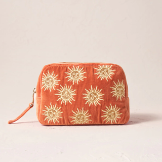 tried and tested gifts: elizabeth scarlett orange velvet makeup bag with gold embroidered sun pattern