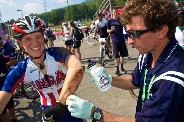 Katie Compton (United States) gets some medical attention after the team relay.