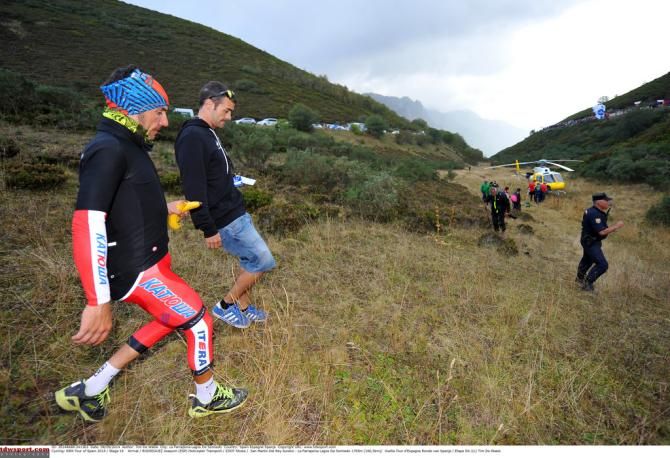 Riders head down to the helicopter in order to get off the mountain