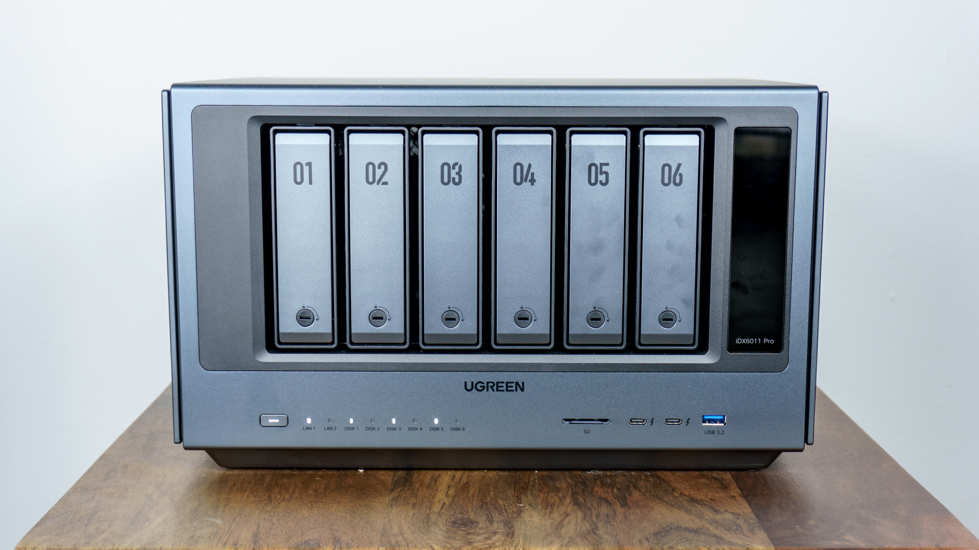 The Ugreen iDX6011 Pro NAS on a table
