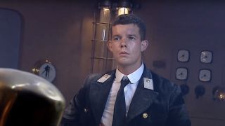 Russell Tovey's Doctor Who character looking disheveled on space USS Titanic
