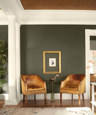 Art Deco living room painted dark green