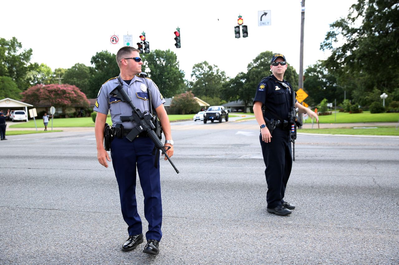 Baton Rouge police respond to a shooting attack on officers