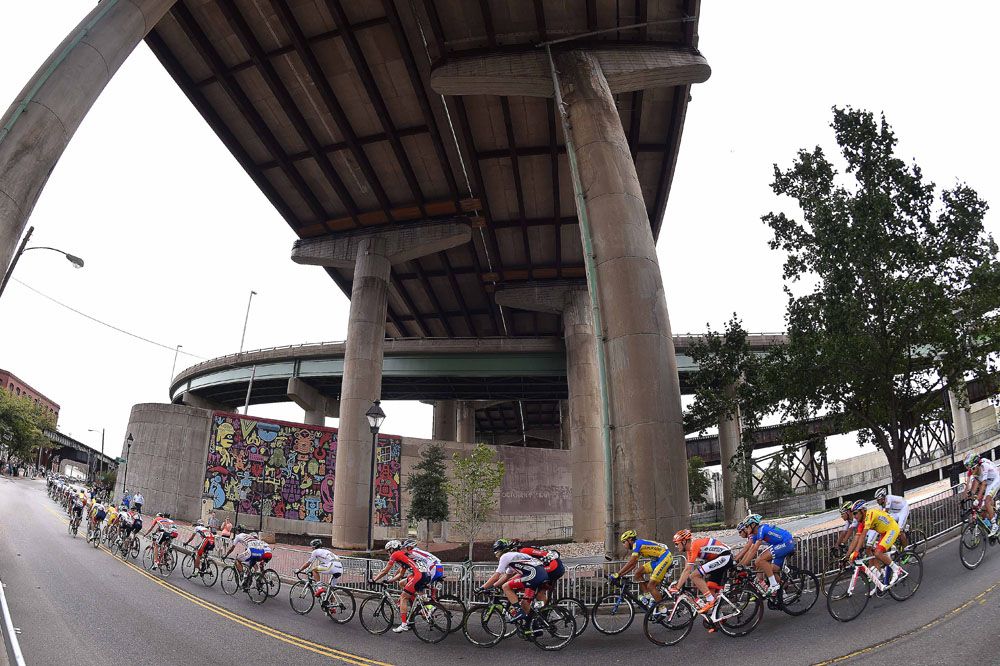 Elite men's peloton stretches out during the road race