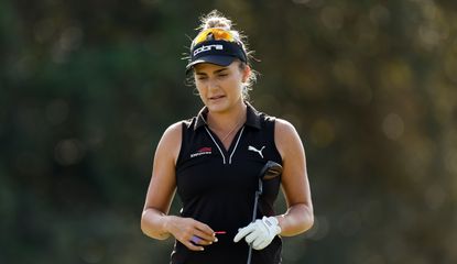 Lexi Thompson reacts to a putt after missing it