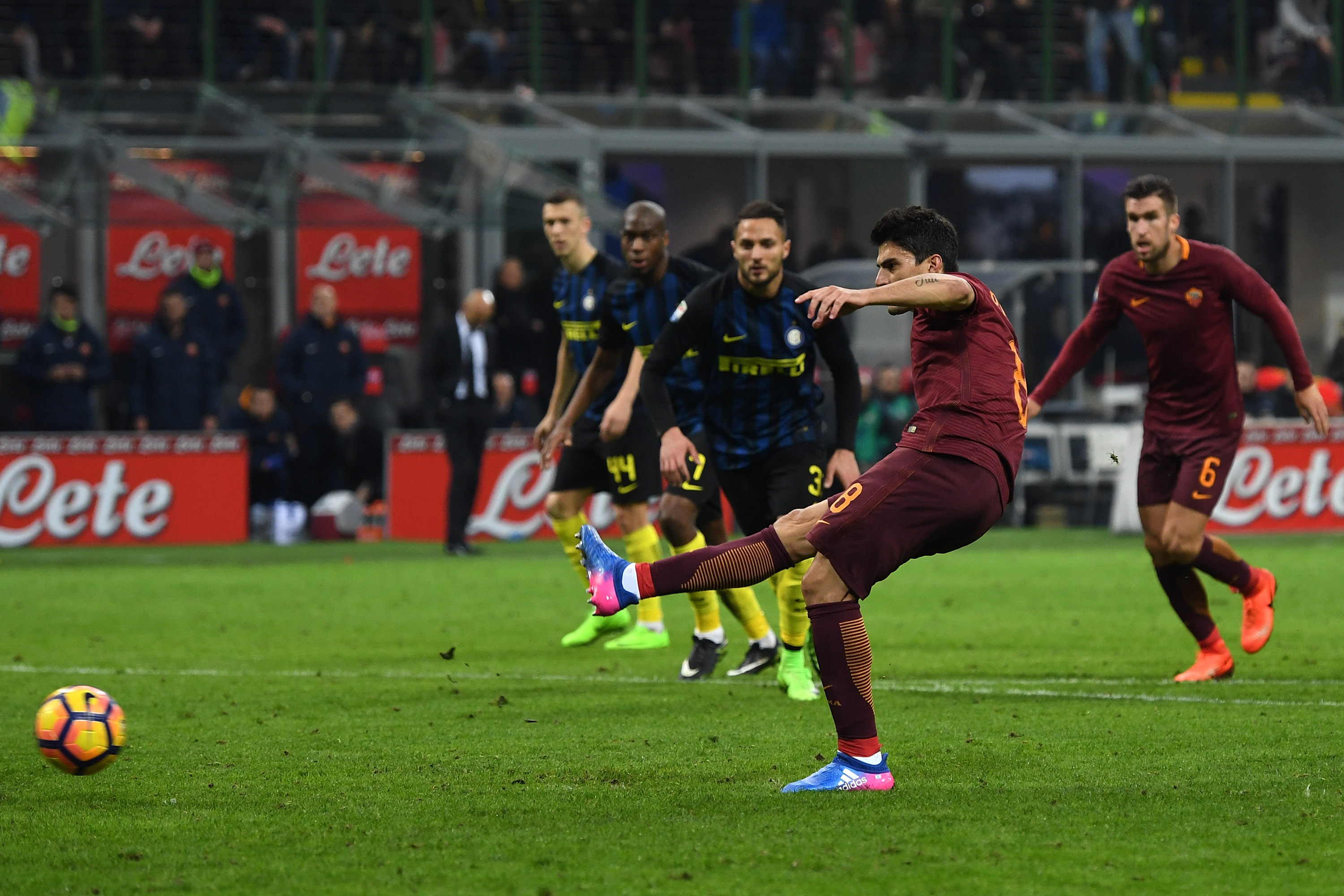 Diego Perotti scores a penalty for Roma against Inter in February 2017.