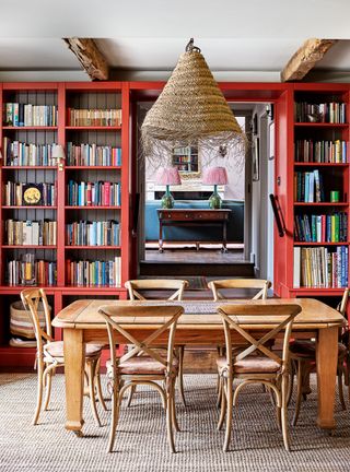 Bookshelf painted red with wraparound design