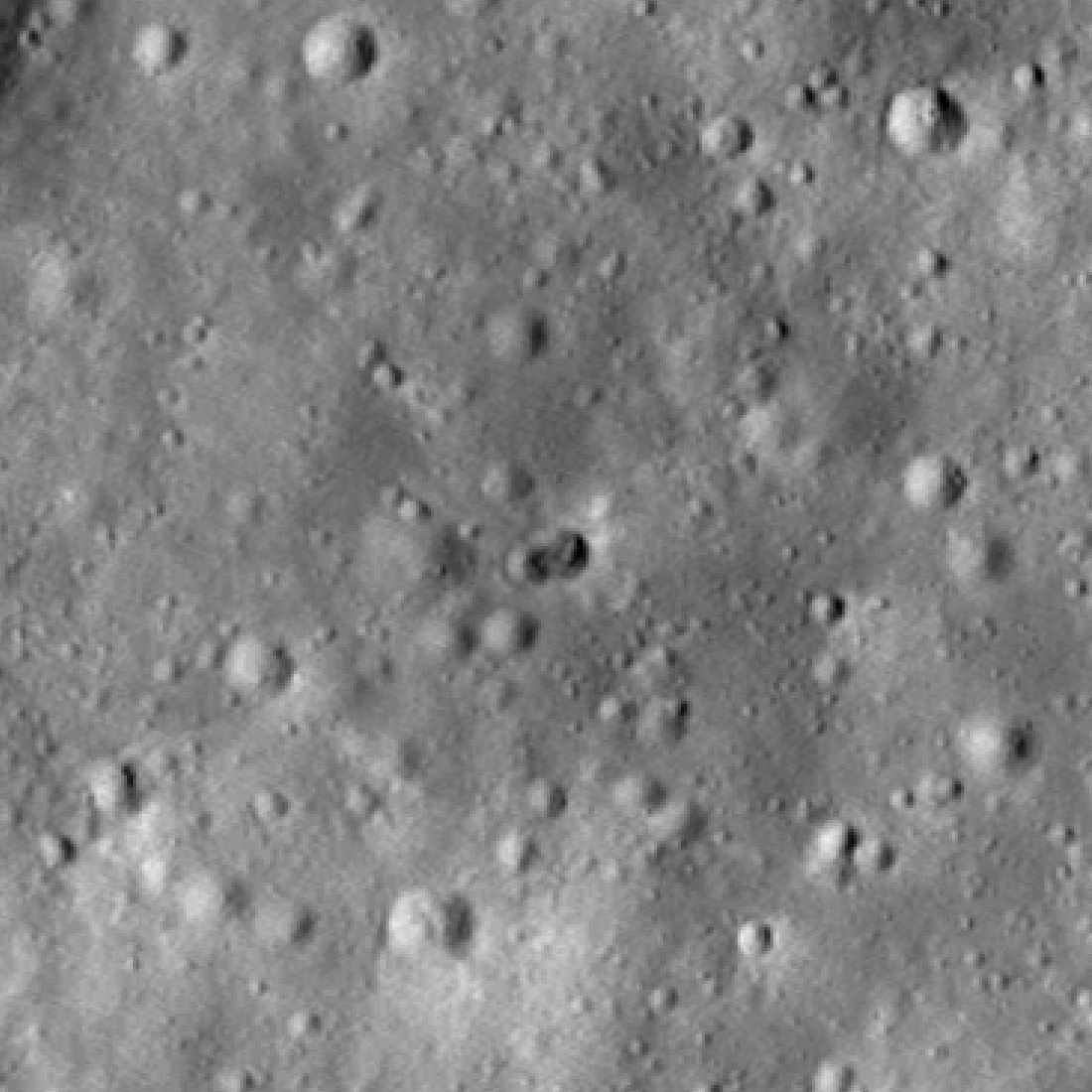 gif showing two images of the lunar surface, new craters are visible in the second one - caused by the rocket crash.