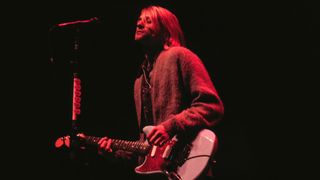 Kurt Cobain performs using his Sky Stang I Fender Mustang in December 1993