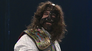 Mankind holding championship belt in WWE
