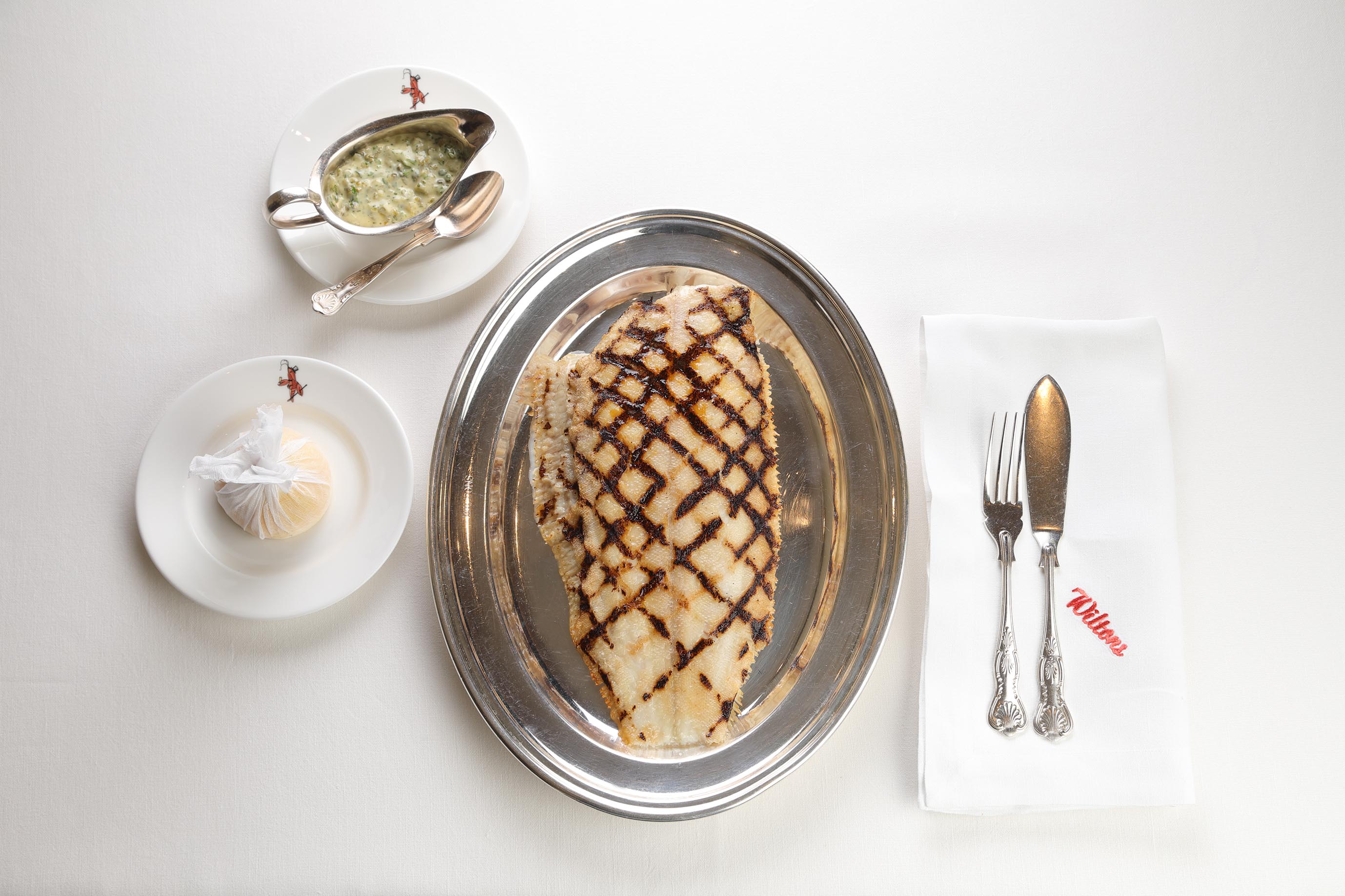 Dover sole fillet on a silver platter