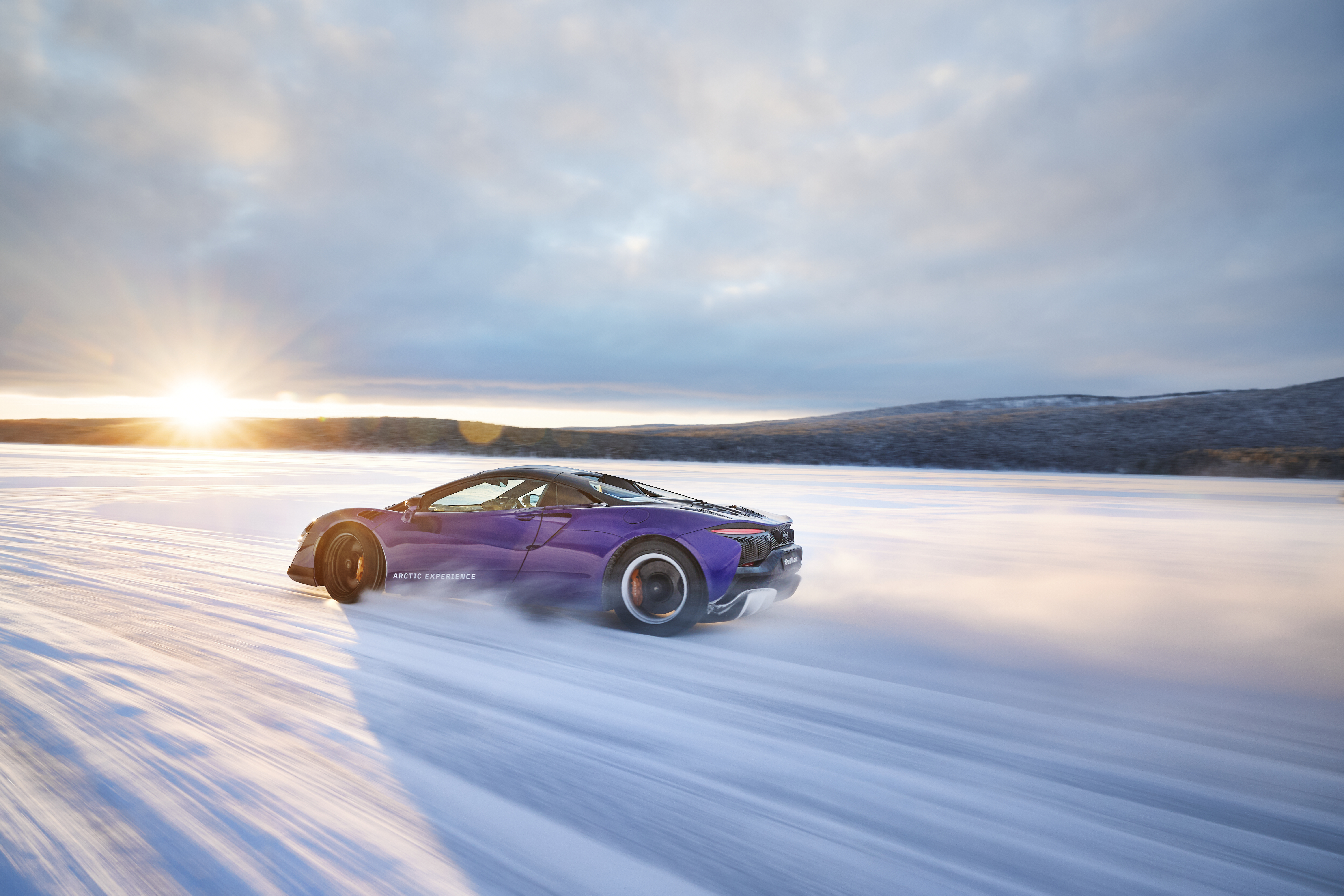 Images of a McLaren Artura going sideways on some ice
