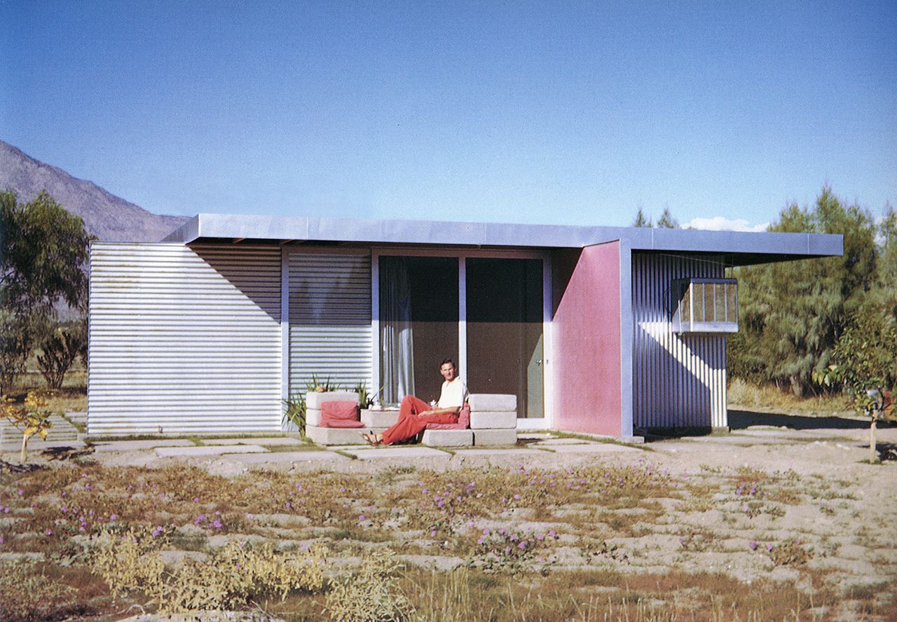 Albert Frey House l a.k.a. Frey I with Albert Frey Seated, Albert Frey, 1940. Photographer Unknown. part of the palm springs school