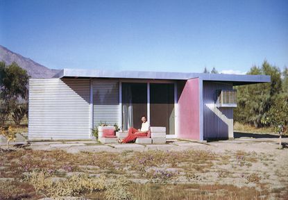 Albert Frey House l a.k.a. Frey I with AlbertFrey Seated, Albert Frey, 1940. Photographer Unknown. part of the palm springs school