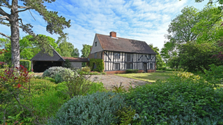A 16th-century home with exterior beams