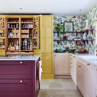 Shaker style kitchen in burgundy, blush pink and butter yellow from Magnet
