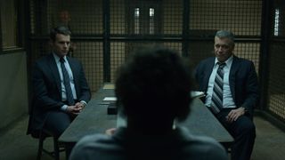 Jonathan Groff (as Holden Ford) and Holt McCallany (as Bill Tench) in an interrogation scene from Mindhunter