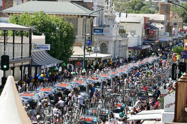 Team vehicles lined up in Gawler's main street .
