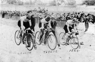 Major Taylor held at the start with Iver Lawson and Willie "Boy Wonder" Fenn, Sr in the Newark Velodrome, 1901